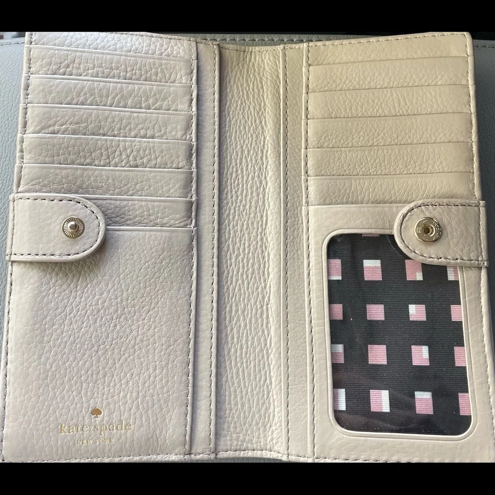 kate spade pale pink bow zip-around wallet